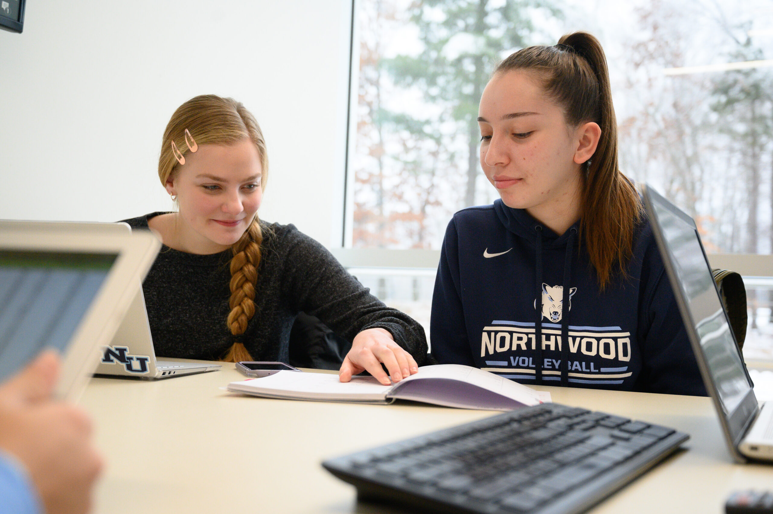 Northwood students researching in a room on campus